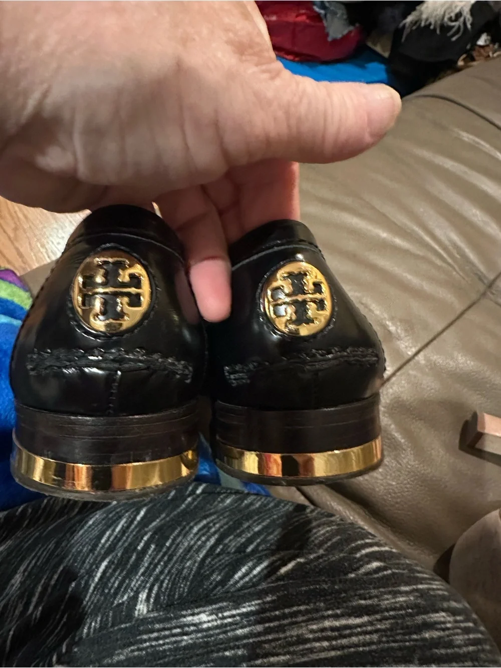Tory Burch Polished Blk leather Penny Loafers with gold accent heal and logo EUC